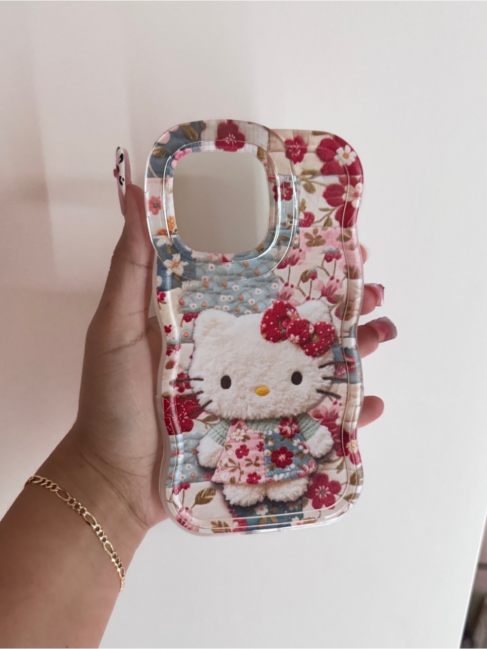 Hello Kitty Quilted Floral Phone Case. 14 Pro Max